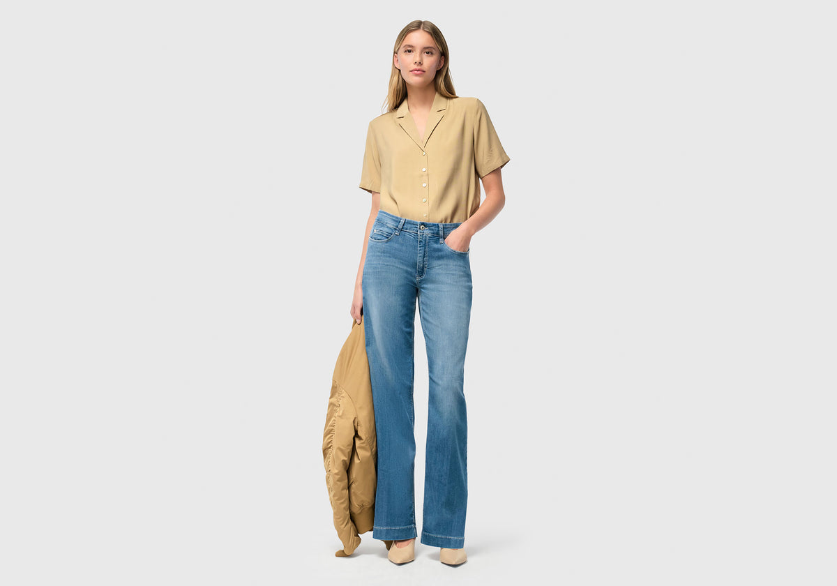 Model wearing Dream Wide with a fitted hip and slight flare from the knee down.