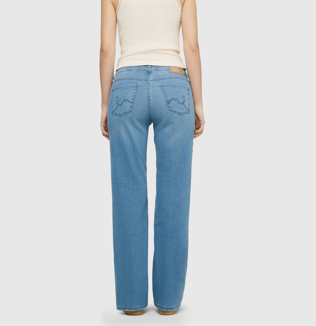 Comfortable flared jeans with seam details. | LAURA | authentic baby blue | Back view of model