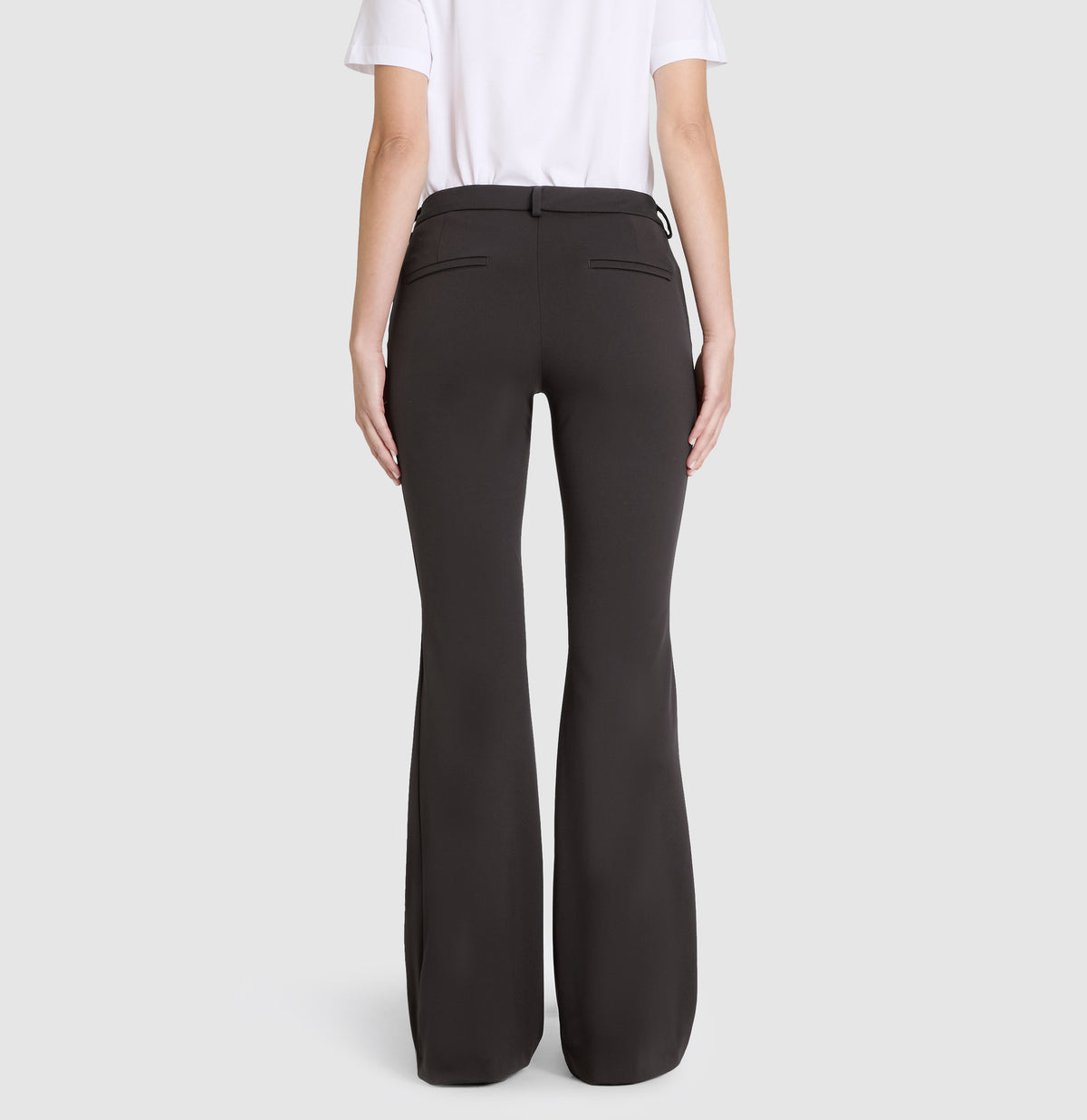 Flared jersey trousers with piping seams. | DREAM BOOT luxury | espresso | Back view of model