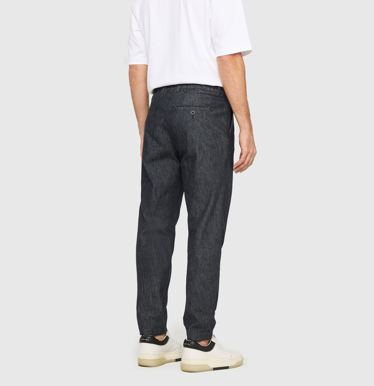 Tapered fit made from wool denim with cashmere content. | Dean Pleat | rinsed deep blue | Back view of model