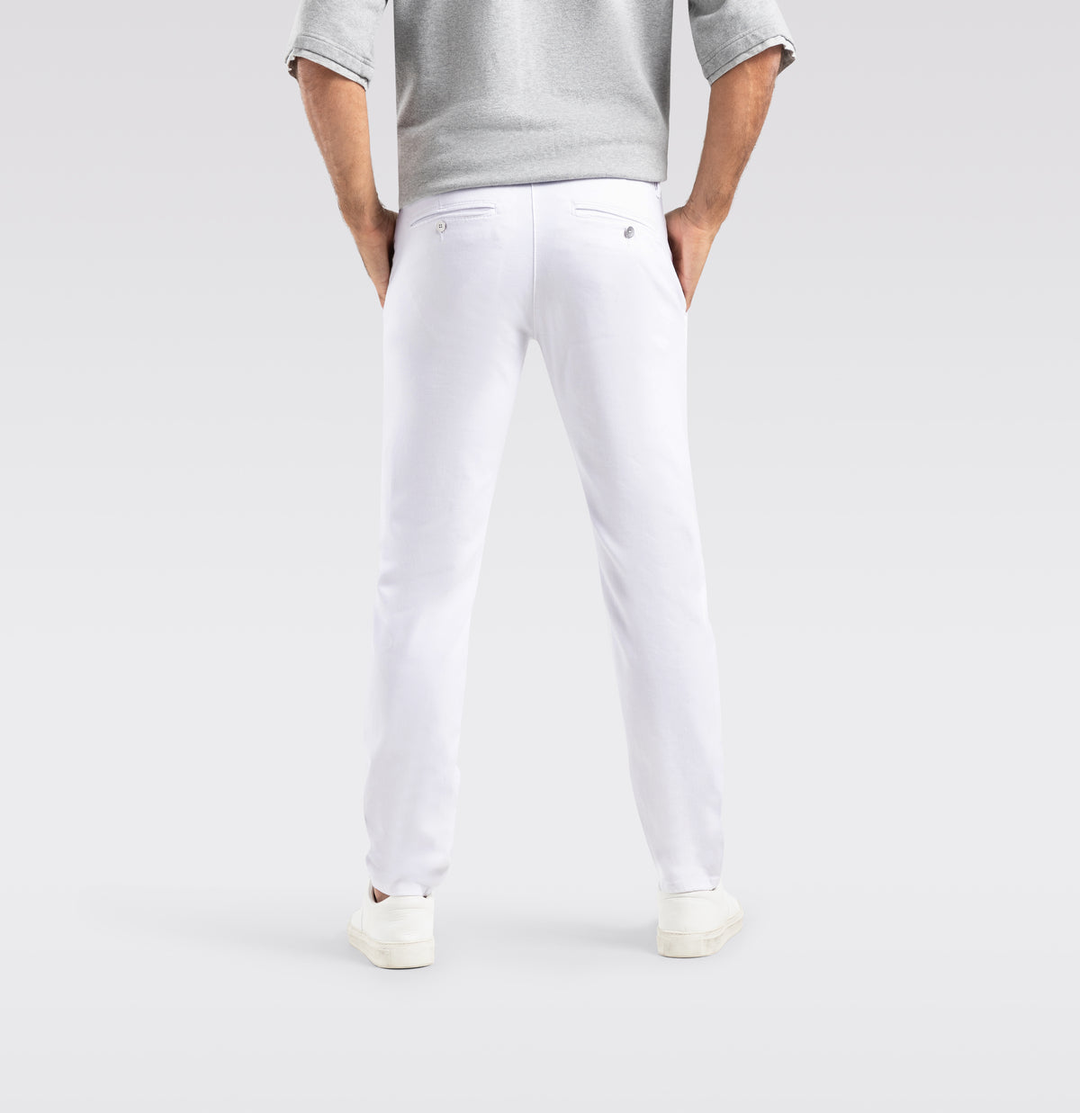 Ultimate driver pants with a chino look. | Driver Pants | white denim | Back view of model