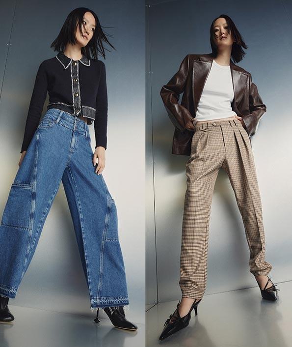 Female model wearing MAC jeans and tailored trousers in a modern studio shoot.