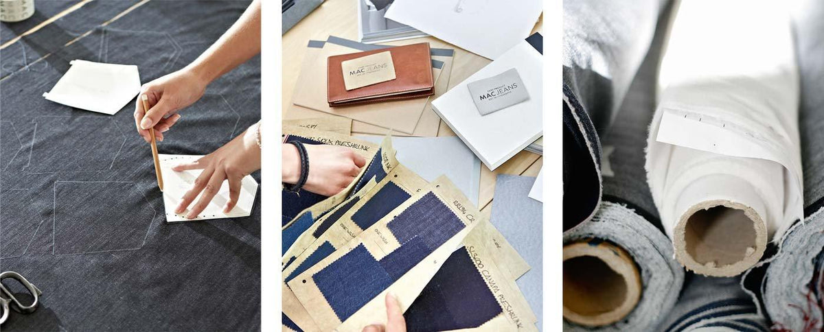 Hands working on denim patterns, fabric swatches, and rolled materials showing the MAC Jeans design and development process.