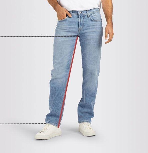 Man wearing light blue jeans with marked seam line, illustrating precise trouser alteration.
